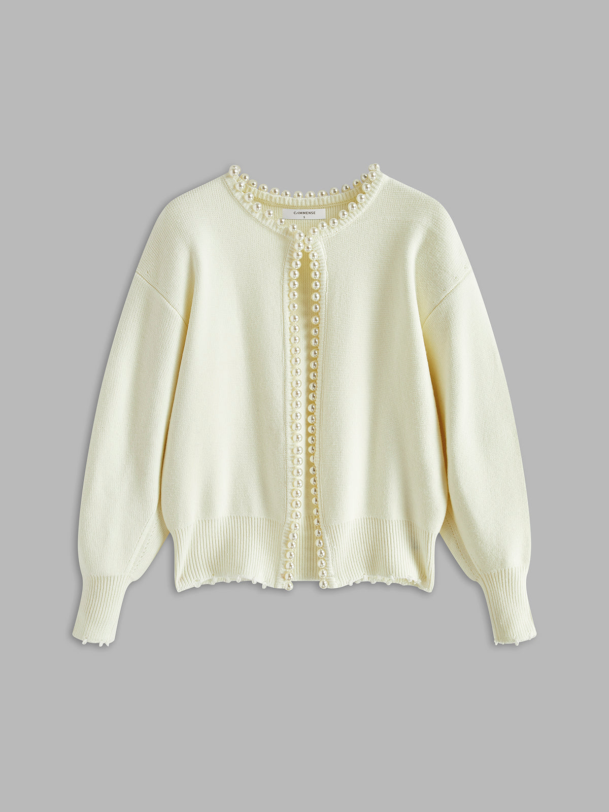 Cardigan met parelrand en gescheurde zoom