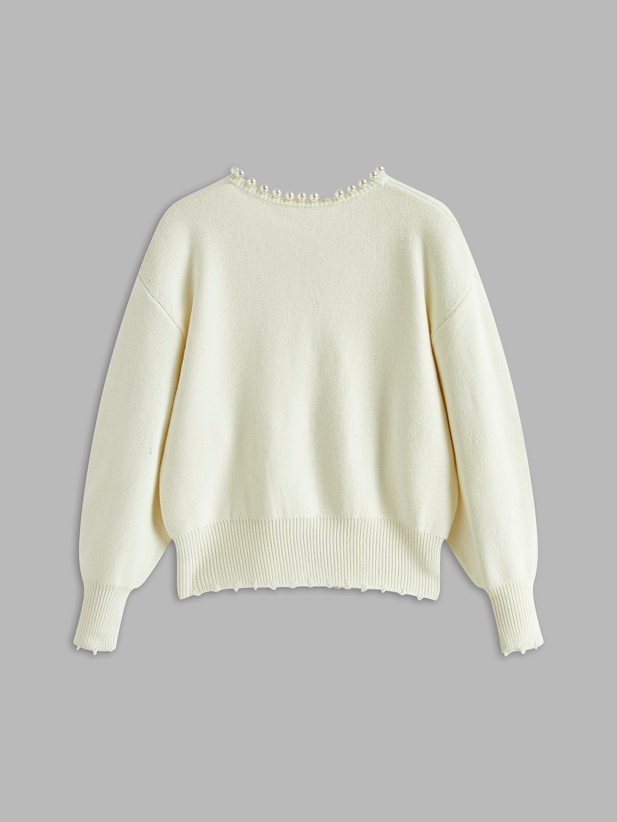 Cardigan met parelrand en gescheurde zoom