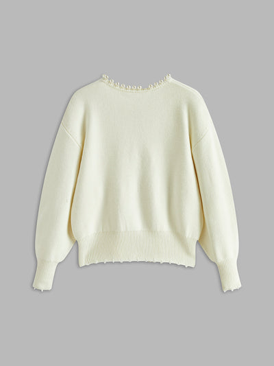 Cardigan met parelrand en gescheurde zoom